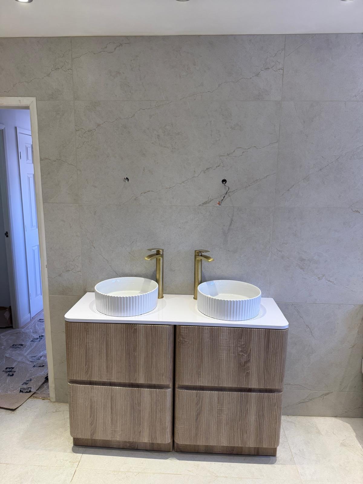 Twin vanity fully tiled