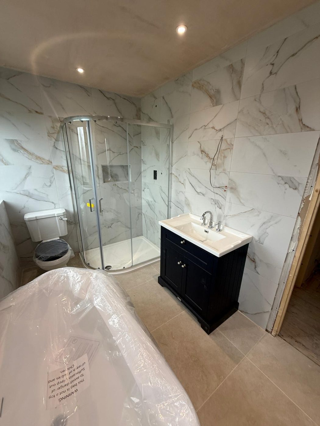 Finished marble bathroom